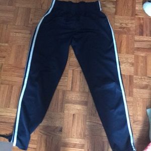 Blue joggers with white stripes